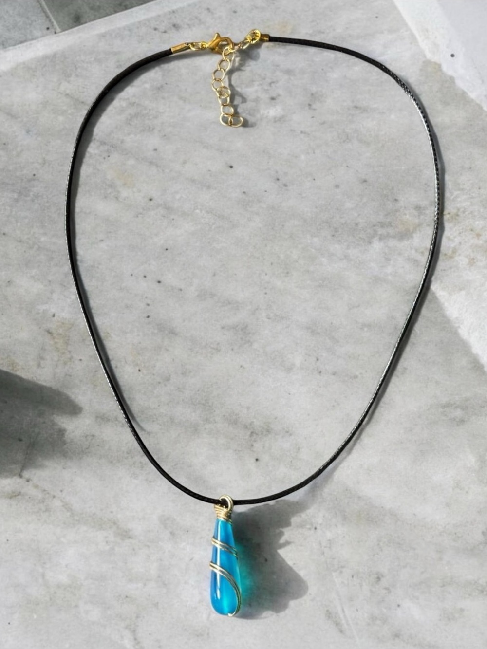 Blue Acrylic Teardrop Pendant Necklace | Black Cord Gold Wire Wrap